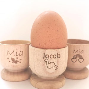 Personalised Wooden Egg Cup, Unicorn, Rainbow and Dinosaur Design, Children&#39;s Novelty Engraved Egg Cups. EGG holders, Kids Egg Cups.