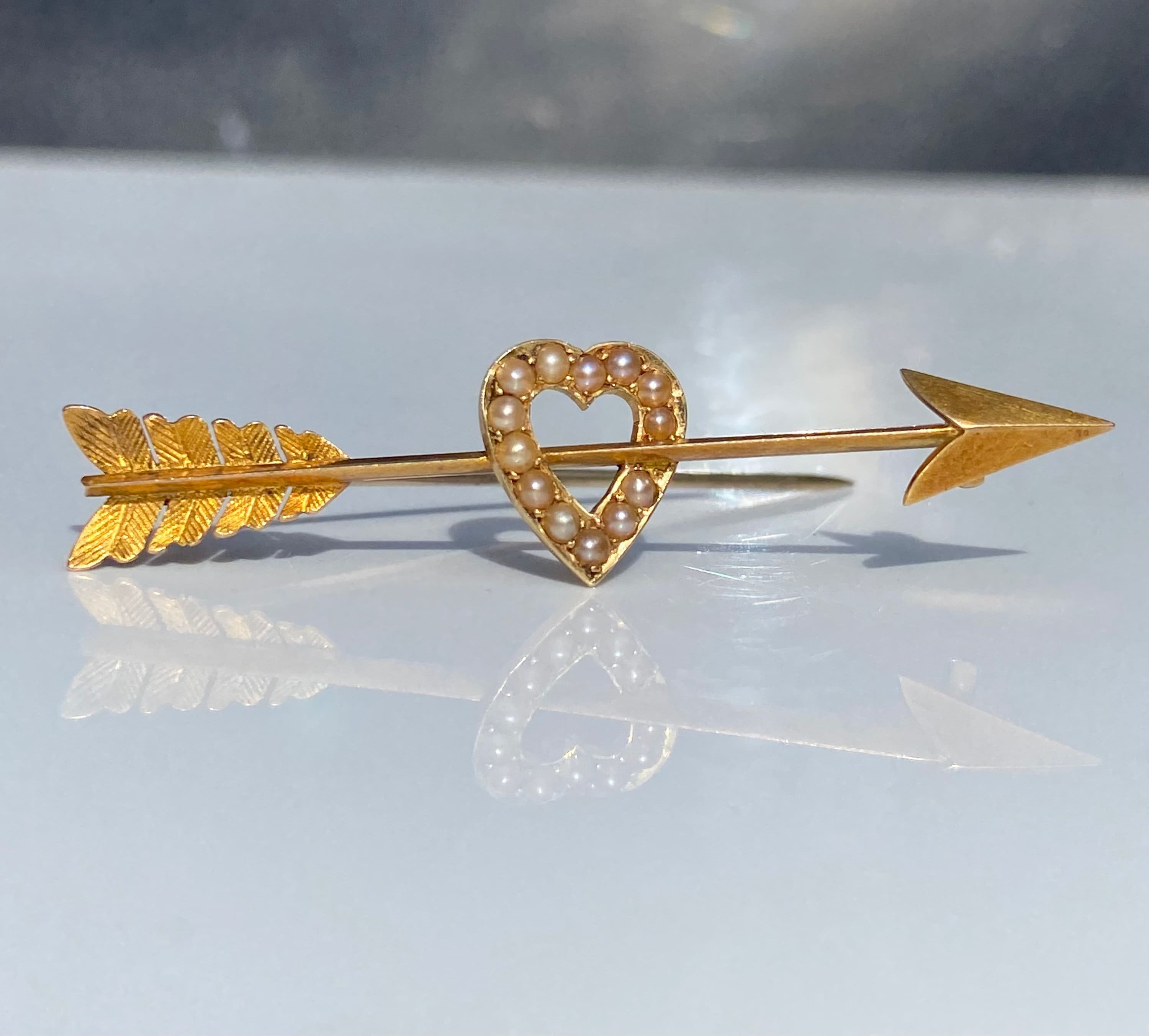 Arrow brooch discount