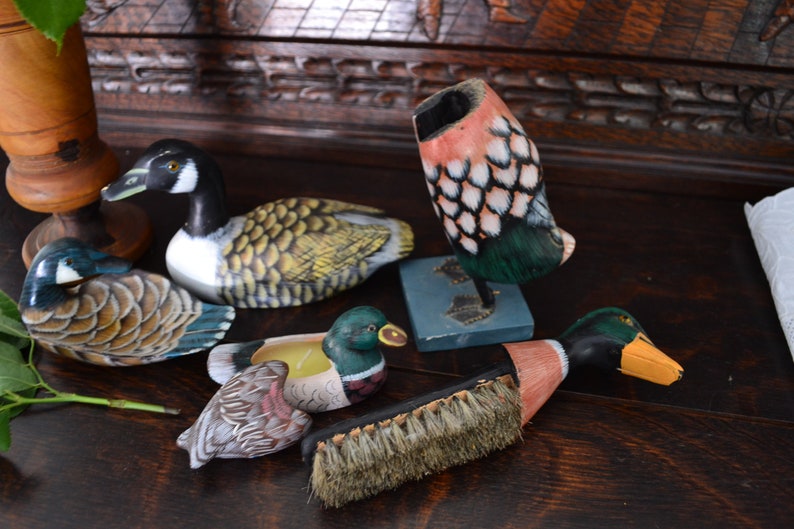 wooden period of the 1980s. rustic farm d\u00e9cor The set of 4 ceramic ducks Drawing by hand