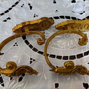 Vintage curtain pole holders, wall shelf brackets, curtain tiebacks holdbacks, salvaged antiques from the late 19th/early 20th century.