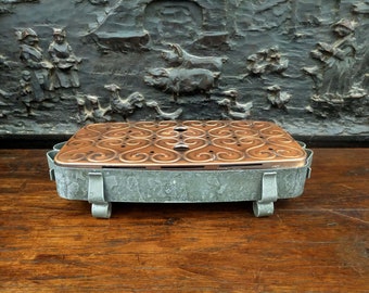 Vintage copper and iron dish warmer. French farmhouse. Souvenir of traditional life.