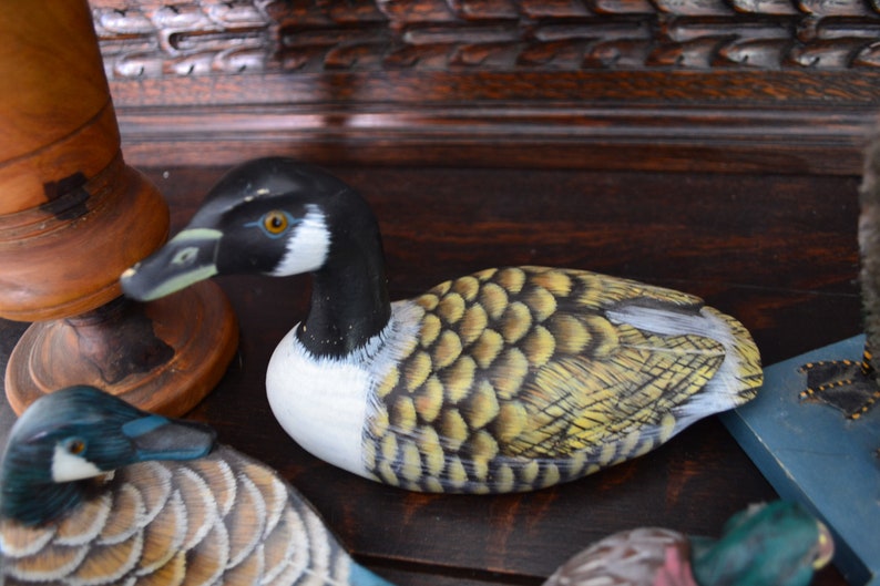 wooden period of the 1980s. rustic farm d\u00e9cor The set of 4 ceramic ducks Drawing by hand