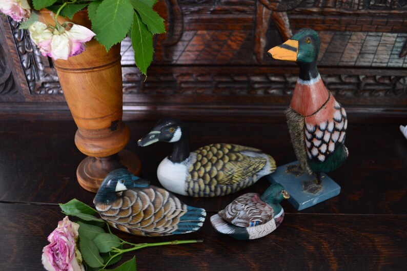 wooden period of the 1980s. rustic farm d\u00e9cor The set of 4 ceramic ducks Drawing by hand