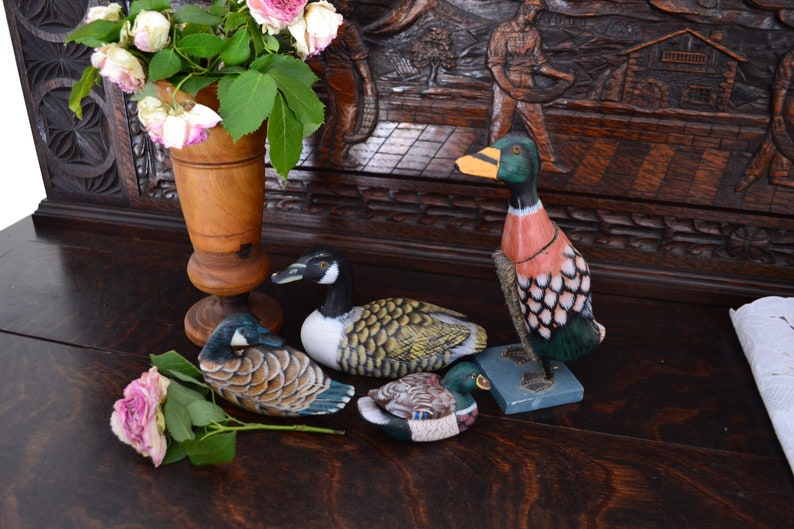 wooden period of the 1980s. rustic farm d\u00e9cor The set of 4 ceramic ducks Drawing by hand
