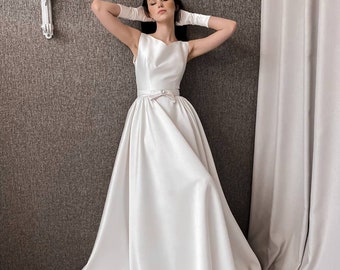 Elegant satin wedding dress, Modest A-line wedding dress, Minimalist wedding dress with open back, Simple Boat neck bridal gown