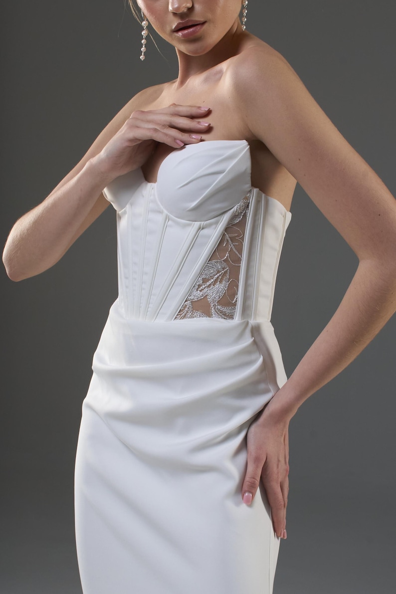 Robe de mariée sirène en dentelle féerique bustier