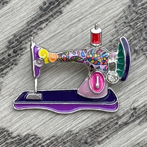 Sewing machine pin with enamel