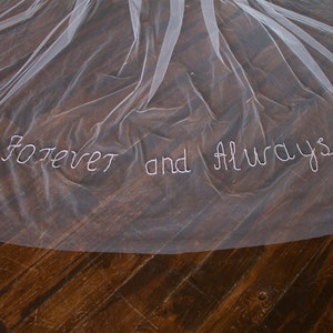 Cathedral wedding veil with monogram with phrases embroidered with beads