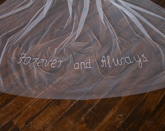 Cathedral wedding veil with monogram with phrases embroidered with beads