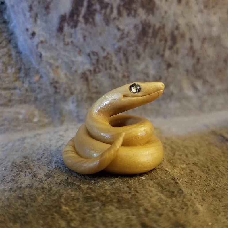 clay snake sculpture