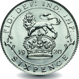 Peut inclure: Une pièce de six pence en argent de 1920 avec l'inscription "FID: DEF: IND: IMP:" et un lion debout sur une couronne.
