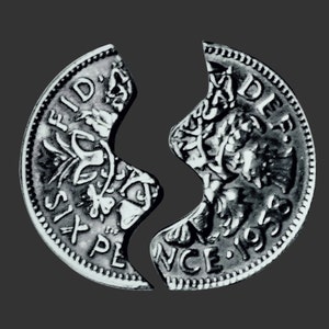 Amuleto de la suerte de medio seis peniques