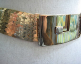 Vintage gold metallic and red stretch belt with geometric clasp