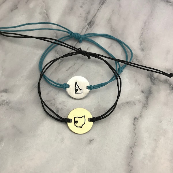 Any US State outline minimalist bracelet with heart over your city. cotton cord, adjustable knot choose your disc & cord colors ONE bracelet