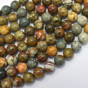 May include: A strand of round, multi-coloured jasper beads. The beads are a mix of brown, green, yellow, and orange with white and black speckles.