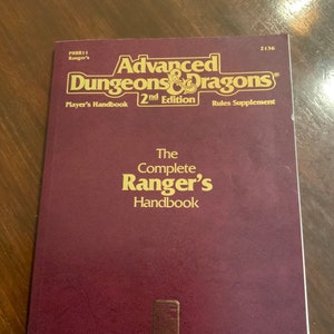 Dungeons and Dragons Framed Art Gary Gygax D&D TSR RPG Roleplaying Game  Player's Handbook Cover Barbarian Ranger Wizard Rogue Jeff Easley 