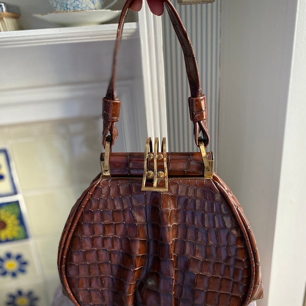 vintage art deco  1930s 1940s brown vinyl croc pattern handbag with great gold clasp.
