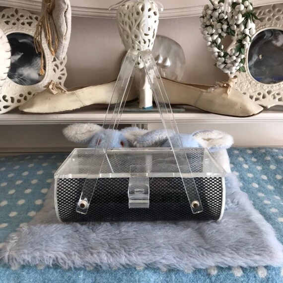 1950s Lucite box bag with criss-cross design.