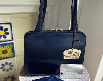 1950s 1960s  polished navy blue leather Waldybag with original purse and mirror. deadstock.