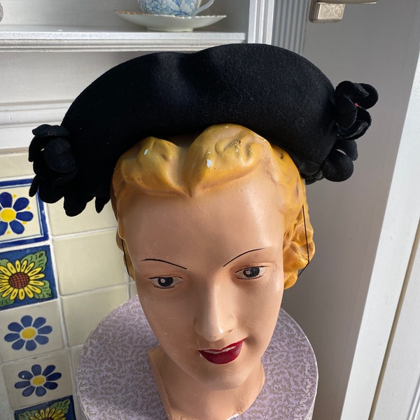 1940s black felt wool half hat with flowers and shell detail. immaculate.