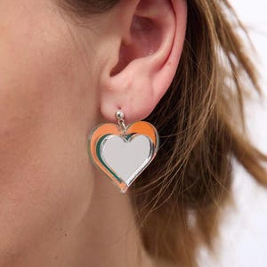 May include: A rustic wooden sign with the text "Welcome to our home" in a handwritten style. The sign features a distressed finish and a simple, inviting design, perfect for a front porch or entryway.