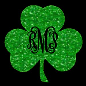 May include: A green glitter shamrock with the initials "RMS" in black script.
