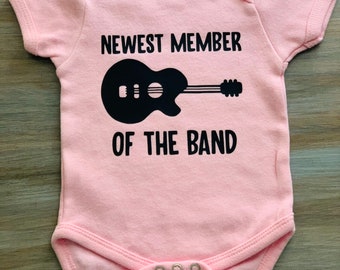 Onesie voor nieuwste lid van de band