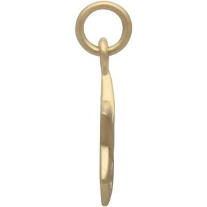 May include: A gold-toned charm in the shape of a crescent moon with a small loop at the top for attaching to a necklace or bracelet.