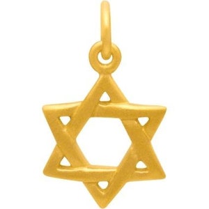 May include: A gold-toned Star of David pendant charm. The charm is a six-pointed star with a smaller six-pointed star inside.