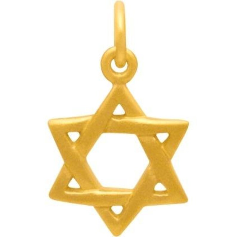 May include: A gold-toned Star of David pendant charm. The charm is a six-pointed star with a smaller six-pointed star inside.