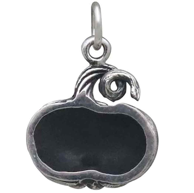 May include: Silver charm in the shape of a pumpkin with a swirl design on the stem. The charm is blank and ready to be personalized.