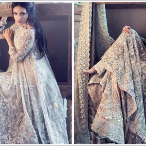 May include: A two-panel image showcases a woman in an elaborate, light-colored gown. The gown features intricate lace and embroidery details, with long sleeves and a flowing skirt. The overall aesthetic is elegant and formal, suitable for special occasions.