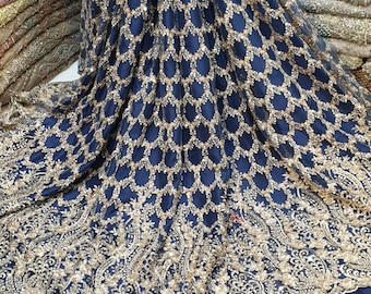 Tejido tul con perlas azules