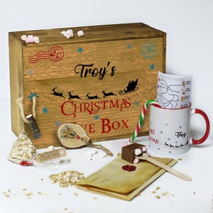 Caja de Nochebuena personalizada con tapa, incluye taza y agitador de chocolate caliente, bastón de caramelo, carta de Papá Noel, bolas de comida de reno con nombre