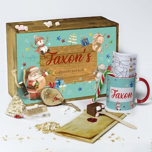 Caja de Nochebuena con tapa personalizada, incluye taza y agitador de chocolate caliente, bastón de caramelo, carta de Papá Noel, bolas de comida de reno con nombre