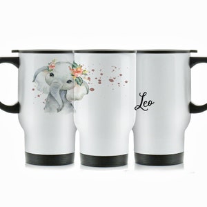 May include: White travel mug with a black lid and handle. The mug features a watercolor illustration of a baby elephant wearing a floral crown. The text "Leo" is printed on the right side of the mug.