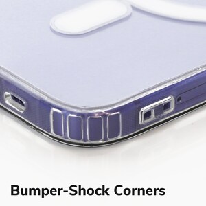 a close up of a cell phone on a white surface
