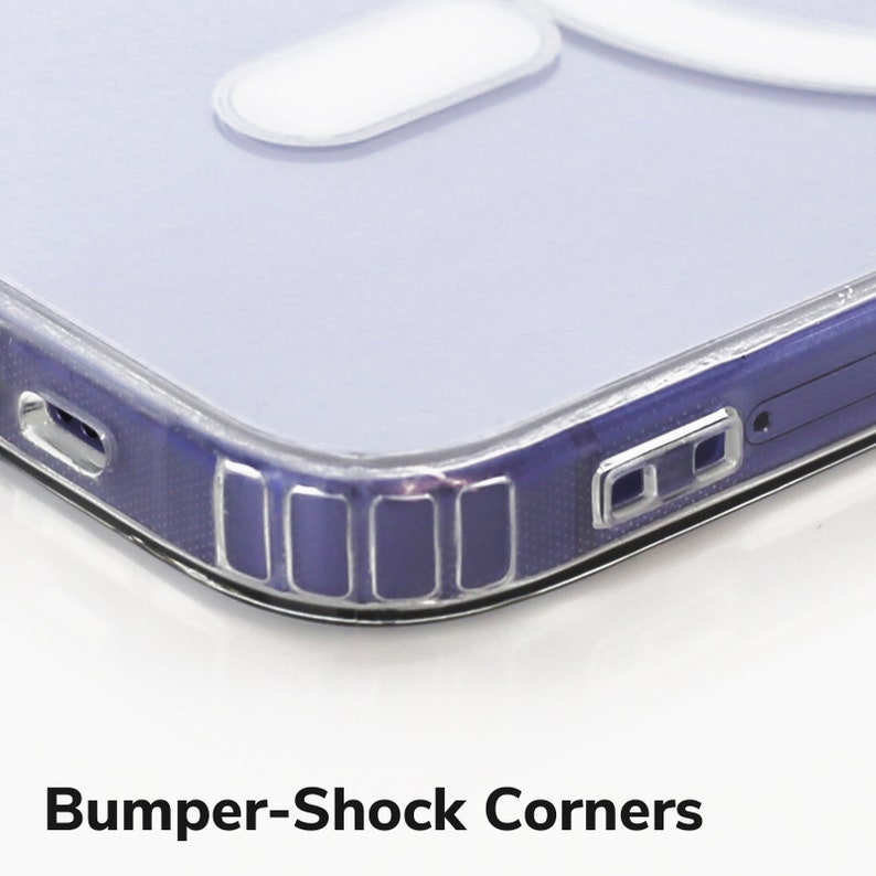 a close up of a cell phone on a white surface