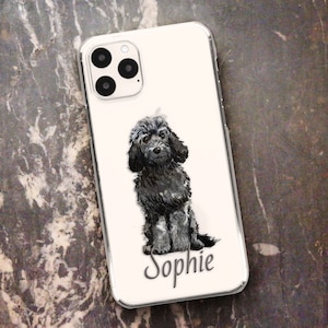 May include: White iPhone case with a black and white illustration of a dog and the name "Sophie" printed on the bottom.