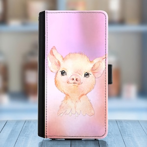 May include: A pink phone case with a watercolor illustration of a cute piglet. The piglet has a pink nose and is looking at the camera.
