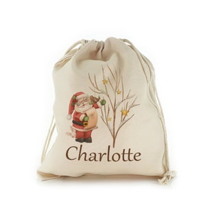 Personalised Christmas gift sack with santa design on a drawstring bag, great stocking with name added
