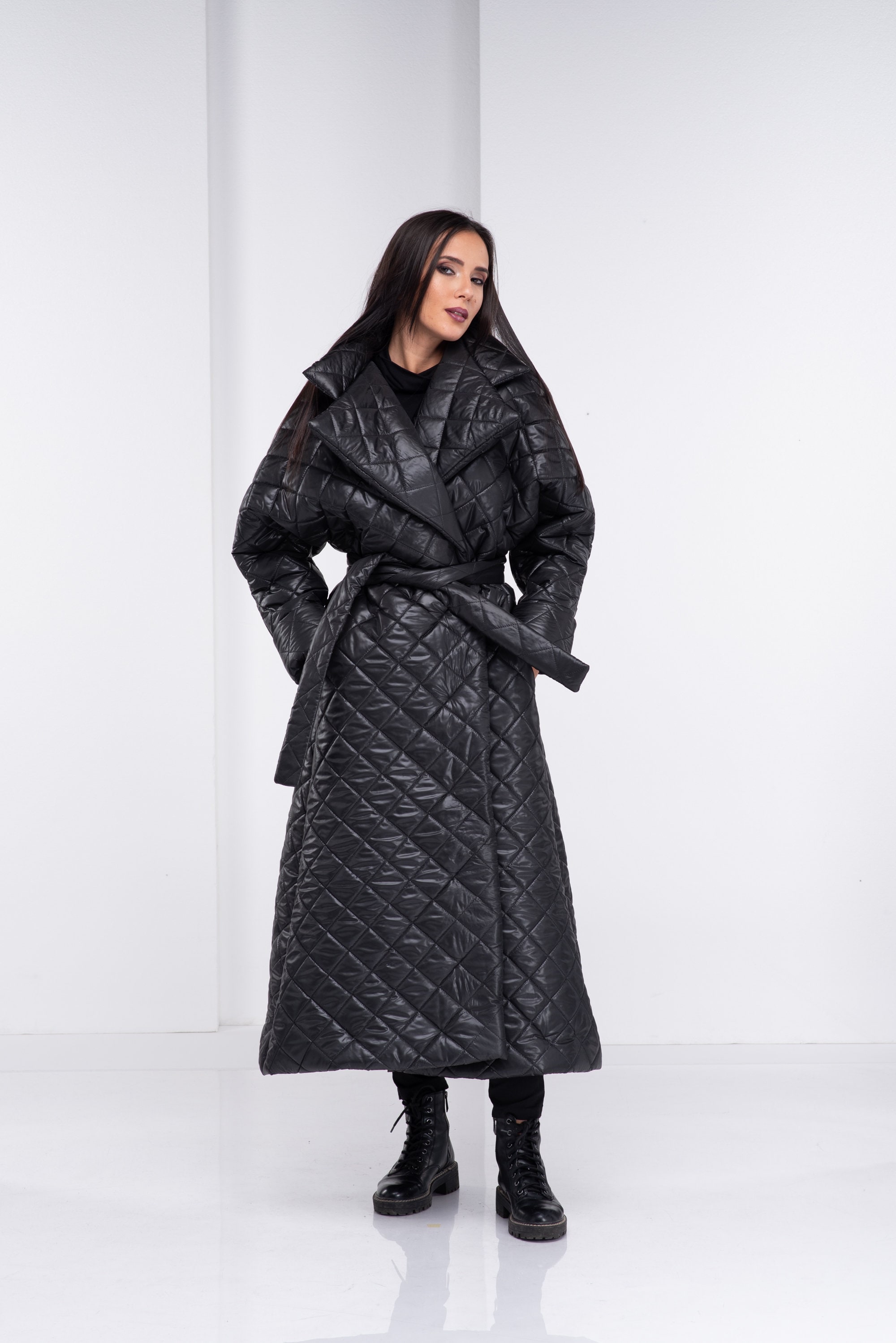 black quilted jacket with belt