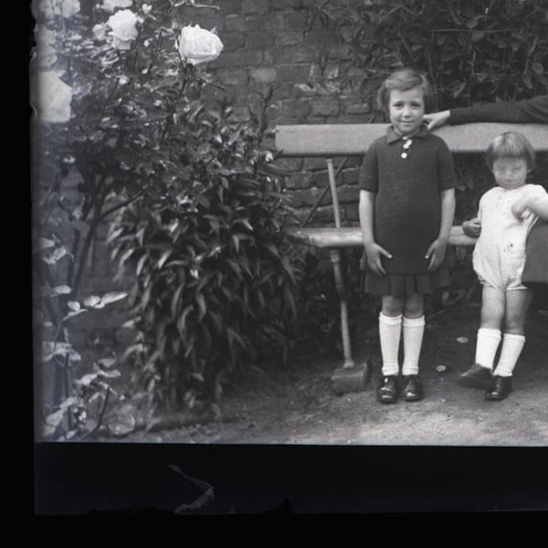 Ghost daughter- antique glass plate negative- 1920- mother and daughters- garden bench