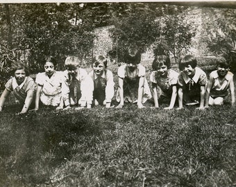 Vintage photo 'All on All Fours' vernacular photos snapshot, young kids posing on hands and knees in the grass