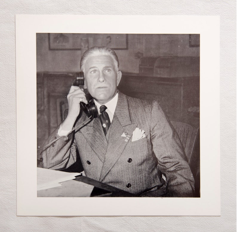 portrait of a man sharply dressed in a suit with telephone The call vintage lithographic photo print