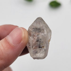 Tibetan Quartz Point. Double Terminated. Carbon Inclusions. 100% Natural Formation. Tibet, China.