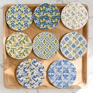 May include: A rustic wooden sign with the text "Welcome to our home" in white lettering. The sign has a distressed finish and a simple, inviting design, ideal for entryway decor.