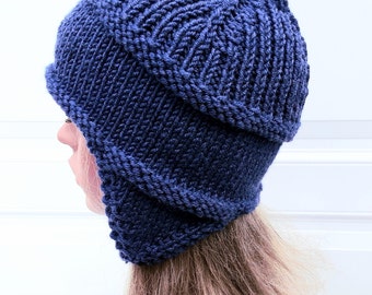 blue earflap hat for women knitted in chunky acrylic yarn size medium-large