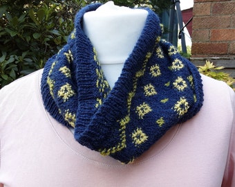 navy cowl with green and yellow patterning knitted in a fairisle design in pure wool