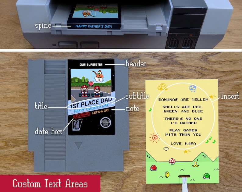 May include: A gray video game cartridge with the text "1ST PLACE DAD" and "HAPPY FATHER'S DAY!" A yellow insert card features a poem about playing games. The console reads "HAPPY FATHER'S DAY!"